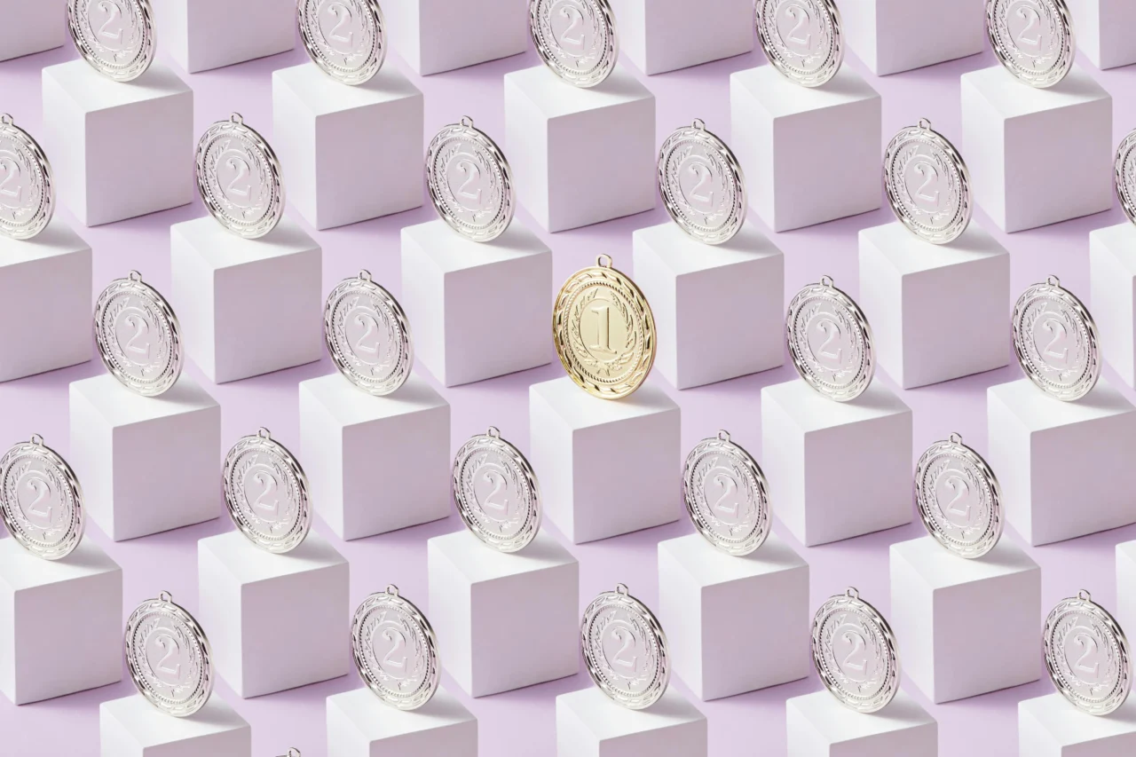 Sports medals arranged on podiums